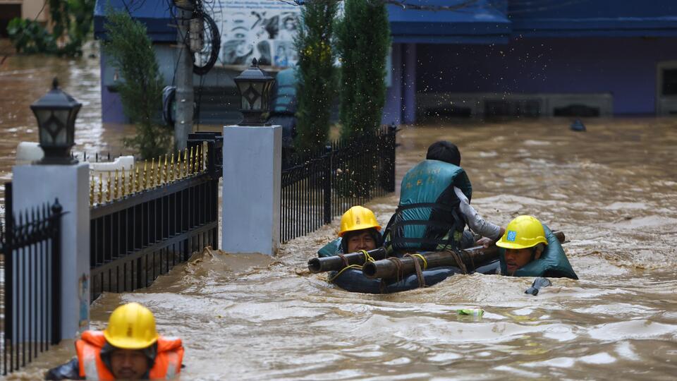 Наводнения в разных частях света. Фото: © www.globallookpress.com/Sulav Shrestha/XinHua
